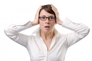Young business woman panic